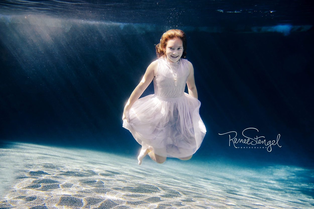 RENEE STENGEL Photography | Charlotte Portrait and Underwater Photographer | Underwater Swimming Girl in Pink | Tween Ballerina