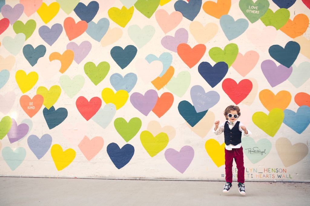 Cool Toddler at Charlotte's Most Popular Public Art Install Confetti Hearts Wall by Evelyn Henson