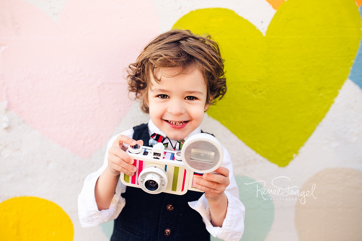 Cool Toddler at Charlotte's Confetti Hearts Wall by Evelyn Henson