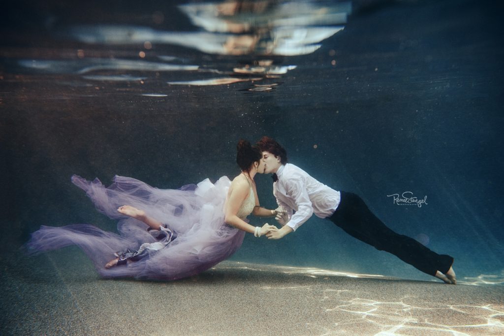 Charlotte Underwater Fashion Senior couple for Underwater Kiss in Purple Tulle and Tuxedo