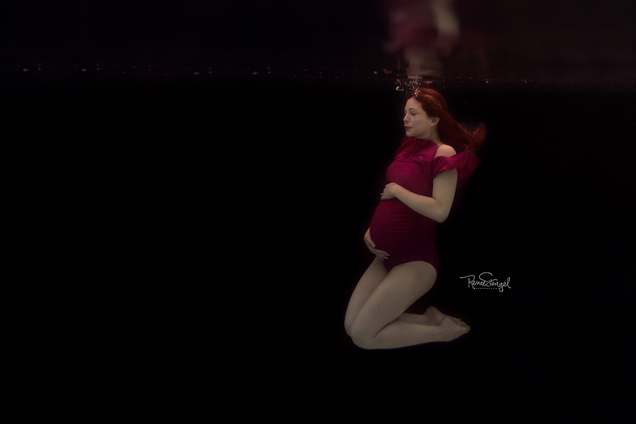 Underwater Maternity hot pink swimsuit and fine art black background