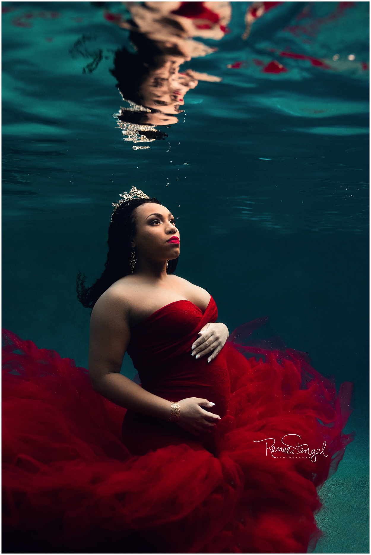 African American Underwater Maternity in Sew Whimsey Tulle and Lace Red Gown with Pearl Hairpins and Gold Crown