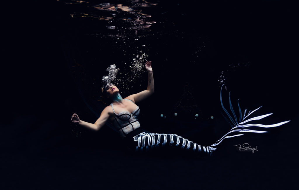 Finfolk Halloween Skeleton Mermaid sinking and blowing bubbles