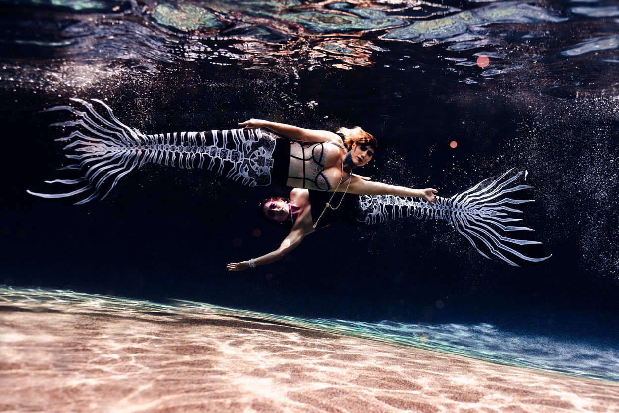 Two Swimming Mermaids in Finfolk Halloween Skeleton Mermaid Tails