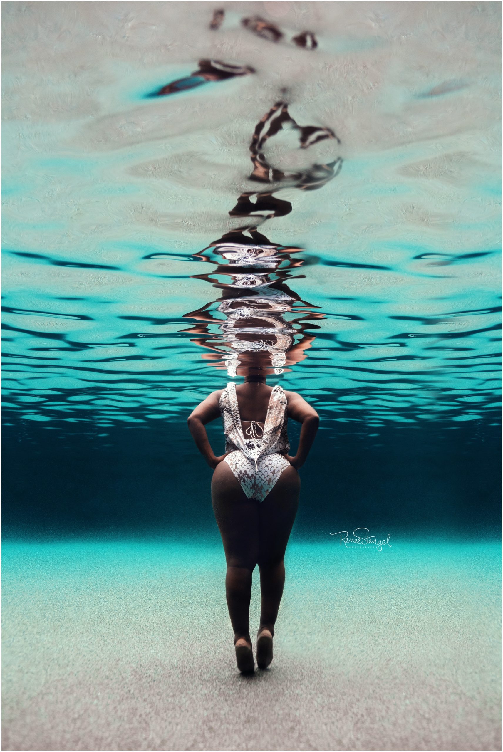 Unique Underwater Maternity Photo in Tropical Blues