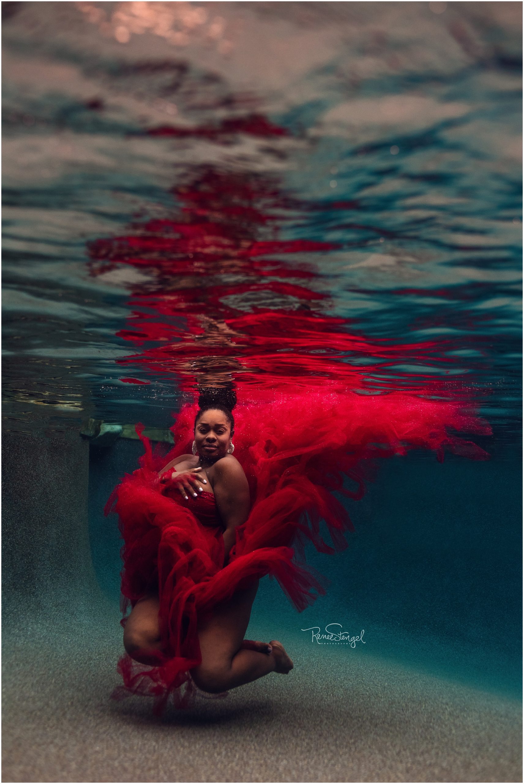 Unique Underwater Maternity Portrait in Red Tulle Couture Gown