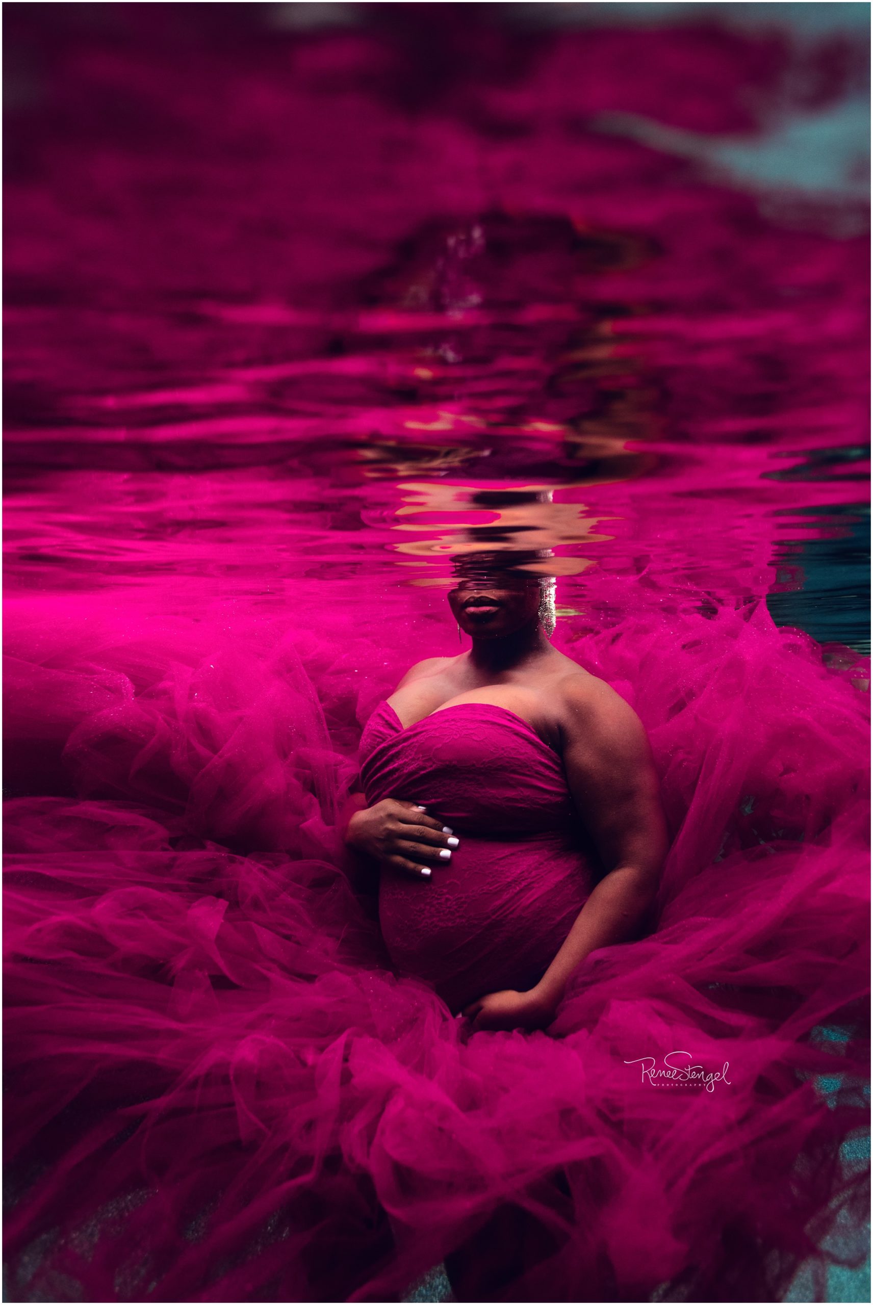 Unique Underwater Maternity Portrait in Pink Tulle Couture Gown