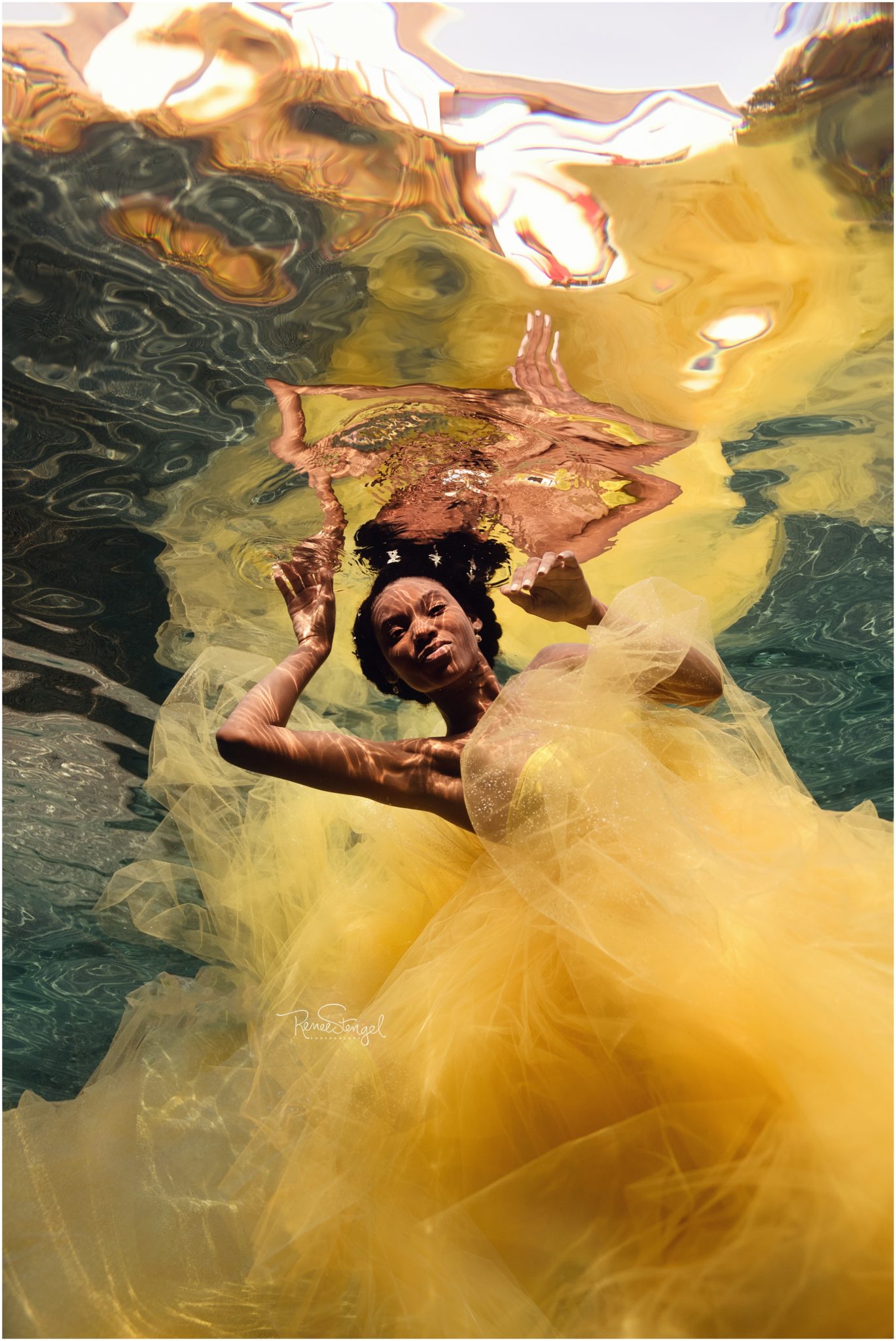 African American Underwater in yellow tulle with natural hair