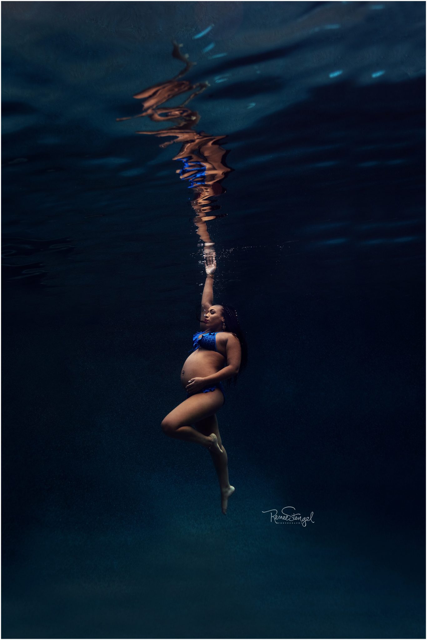 African American deep Underwater in Blue Bikini