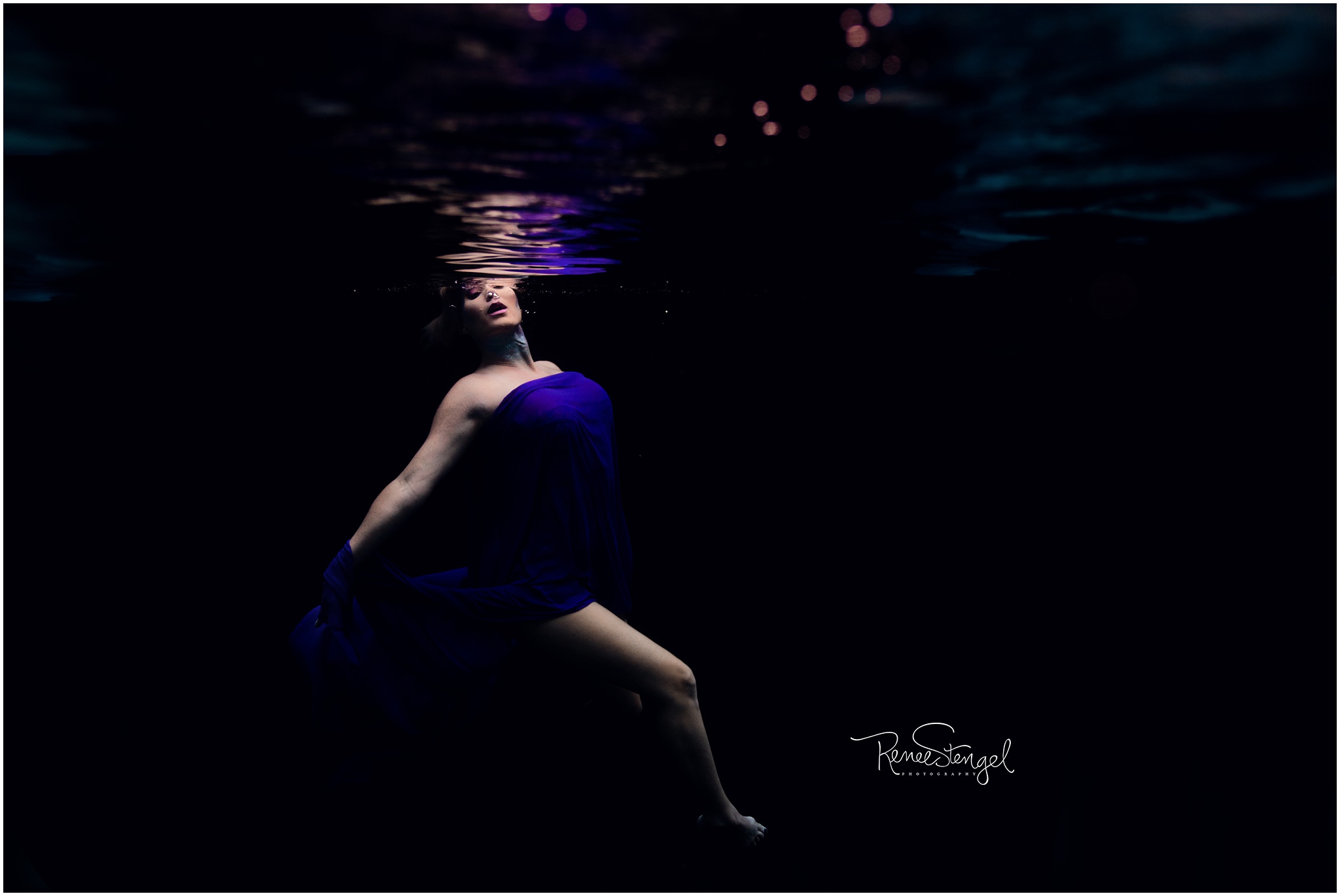 Boudoir Fashion Underwater Portrait with bold color makeup