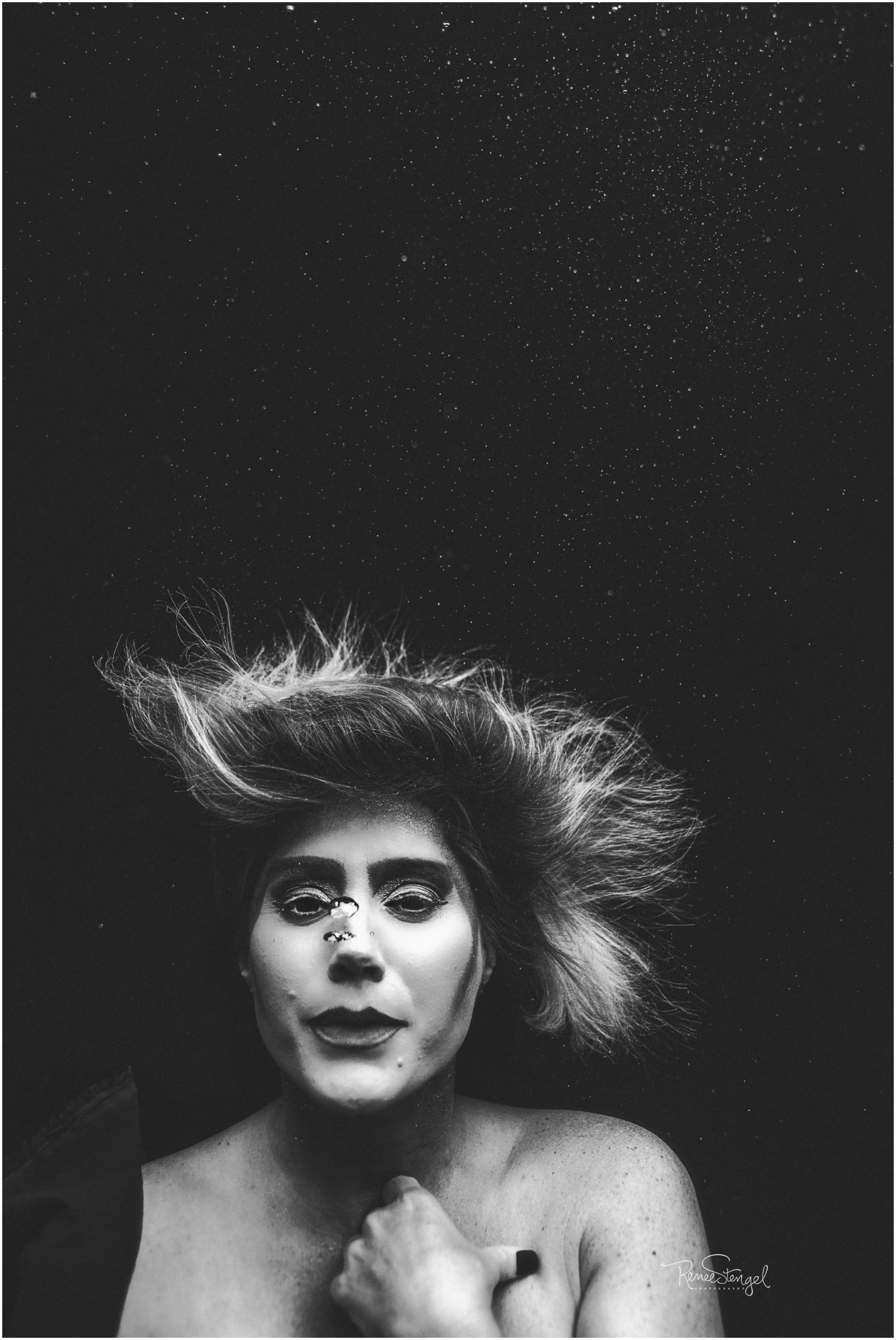 Contemporary Black and White Underwater Portrait with bold makeup and bubbles