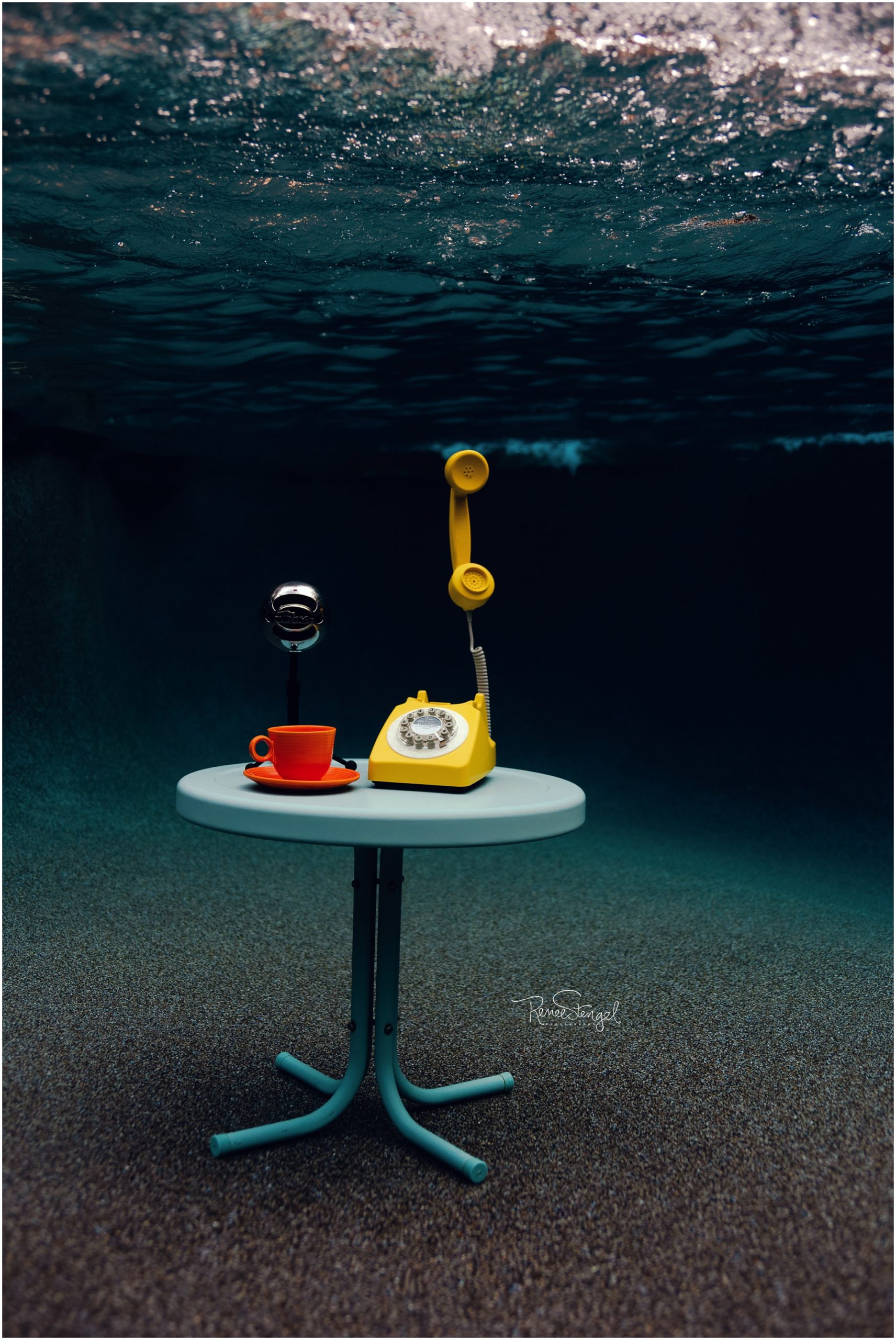 Choosing a Niche in Underwater Photography Podcast with Crafted to Thrive | Blue Snowball Podcast Mics, Yellow Vintage Phone and Orange Fiestaware Teacup Underwater on Tiffany Blue Table
